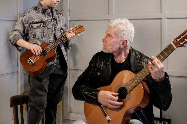 How do developmental disorders affect music education?